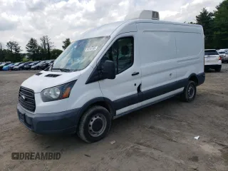 2016 Ford Transit Cargo z VIN 1FTYR2CM5GKB15310, wystawiony jako Copart lot #59266185 z przebiegiem 64 352 mil mil oraz Tytuł czysty. Historia ofert i sprzedaży dostępna na DreamBid. Obrazek 1.