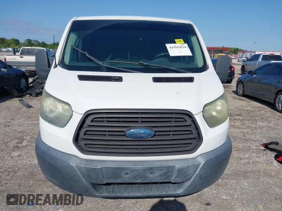 2015 Ford Transit Cargo with VIN 1FTNE1ZM0FKA90248, listed as a IAAI auction lot 41995824 with 157,085 mi miles. Bid and sale history available at carsss.com. Image 12.