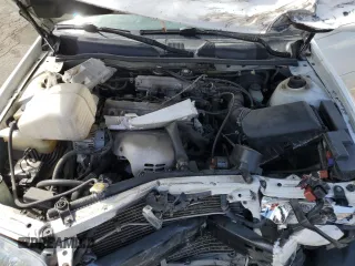 2000 Toyota Camry CE z VIN JT2BG22K2Y0479735, wystawiony jako Copart lot #50226755 z przebiegiem 282 694 mil mil oraz Nie do naprawy • Non repairable. Historia ofert i sprzedaży dostępna na DreamBid. Obrazek 12.