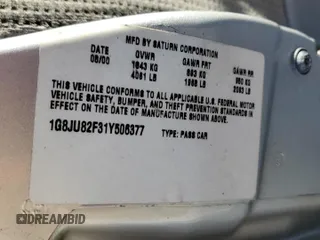 2001 Saturn LW z VIN 1G8JU82F31Y506377, wystawiony jako Copart lot #89013205 z przebiegiem 142 166 mil mil oraz Szkody całkowita. Historia ofert i sprzedaży dostępna na DreamBid. Obrazek 13.