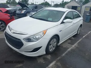 2012 Hyundai Sonata Hybrid with VIN KMHEC4A49CA032414, listed as a IAAI auction lot 42651301 with 136,603 mi miles and . Bid and sale history available at DreamBid. Image 2.