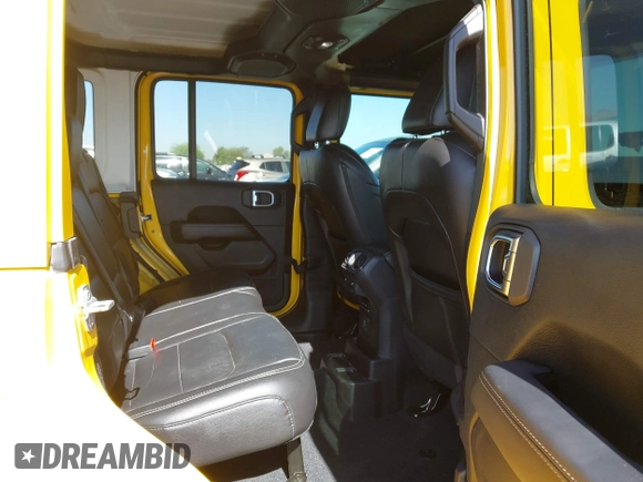 2018 Jeep Wrangler Unlimited Sahara z VIN 1C4HJXEN3JW306282, wystawiony jako IAAI lot #42302821 z przebiegiem 70 204 mil mil oraz . Historia ofert i sprzedaży dostępna na DreamBid. Obrazek 8.