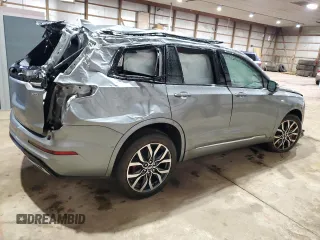 2023 Cadillac XT6 AWD Sport with VIN 1GYKPGRS5PZ121334, listed as a Copart auction lot 50606324 with 10,455 mi miles and Salvage Title. Bid and sale history available at carsss.com. Image 3.
