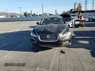 2013 Jaguar XJ with VIN SAJWA2GB0DLV43865, listed as a Copart auction lot 79693934 with 0 mi miles and Salvage Title. Bid and sale history available at carsss.com. Image 10.