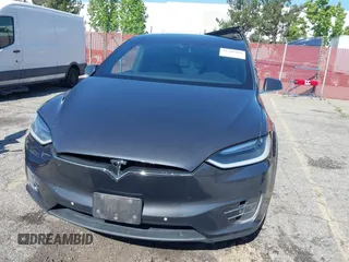 2016 Tesla Model X 70D z VIN 5YJXCAE25GF018477, wystawiony jako IAAI lot #42208404 z przebiegiem 99 380 mil mil oraz . Historia ofert i sprzedaży dostępna na DreamBid. Obrazek 12.