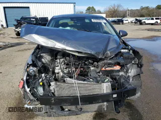 2022 Kia Rio LX with VIN 3KPA24AD4NE464172, listed as a Copart auction lot 87828245 with 63,796 mi miles and Salvage Title. Bid and sale history available at carsss.com. Image 5.