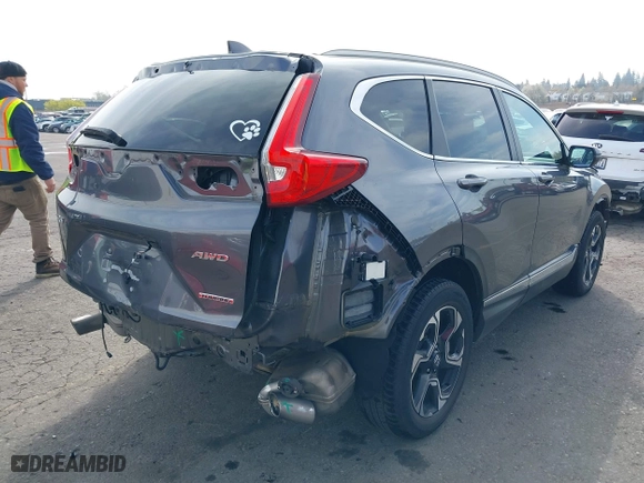 2017 Honda CR-V Touring with VIN 2HKRW2H95HH646184, listed as a IAAI auction lot 41906341 with 58,529 mi miles. Bid and sale history available at carsss.com. Image 4.