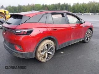 2023 Volkswagen ID.4 Pro S z VIN 1V2FMPE83PC010566, wystawiony jako IAAI lot #42255980 z przebiegiem Nie podano mil oraz . Historia ofert i sprzedaży dostępna na DreamBid. Obrazek 4.