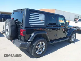 2023 Jeep Wrangler Sahara with VIN 1C4HJXEN5PW508257, listed as a IAAI auction lot 42007569 with 34,990 mi miles and . Bid and sale history available at DreamBid. Image 4.