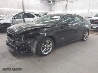 2015 Ford Fusion Titanium Hybrid with VIN 3FA6P0RU2FR309074, listed as a IAAI auction lot 41240630 with 172,025 mi miles. Bid and sale history available at carsss.com. Image 19.