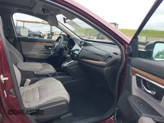 2019 Honda CR-V EX with VIN 7FARW2H56KE053022, listed as a IAAI auction lot 41848570 with 128,676 mi miles. Bid and sale history available at carsss.com. Image 5.