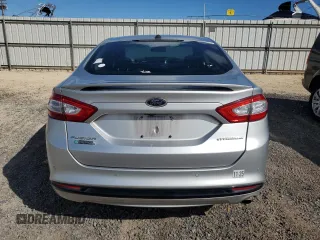 2016 Ford Fusion Titanium with VIN 3FA6P0SU1GR316318, listed as a Copart auction lot 56244015 with 73,451 mi miles and Salvage title. Bid and sale history available at DreamBid. Image 6.