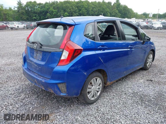 2015 Honda Fit LX with VIN 3HGGK5G59FM711808, listed as a IAAI auction lot 42655848 with 169,780 mi miles and . Bid and sale history available at DreamBid. Image 4.