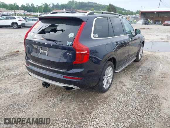 2016 Volvo XC90 T6 Momentum with VIN YV4A22PK7G1058660, listed as a IAAI auction lot 42201130 with 130,487 mi miles. Bid and sale history available at carsss.com. Image 4.