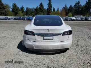2014 Tesla Model S 60 with VIN 5YJSA1H12EFP51909, listed as a Copart auction lot 55489705 with Not Provided miles and Clean Title. Bid and sale history available at DreamBid. Image 6.