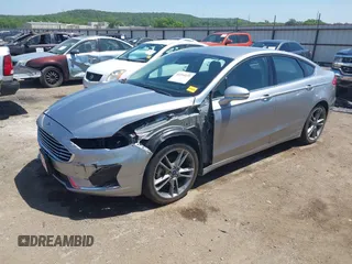 2020 Ford Fusion SEL with VIN 3FA6P0CDXLR196124, listed as a IAAI auction lot 42244231 with 99,306 mi miles and . Bid and sale history available at DreamBid. Image 18.