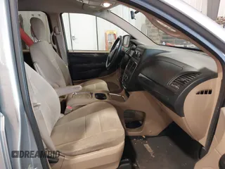 2014 Dodge Grand Caravan SXT with VIN 2C4RDGCG9ER213426, listed as a IAAI auction lot 41044553 with 175,140 mi miles and . Bid and sale history available at DreamBid. Image 5.