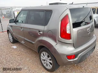 2012 Kia Soul + with VIN KNDJT2A68C7379660, listed as a IAAI auction lot 41991418 with 181,060 mi miles. Bid and sale history available at carsss.com. Image 3.