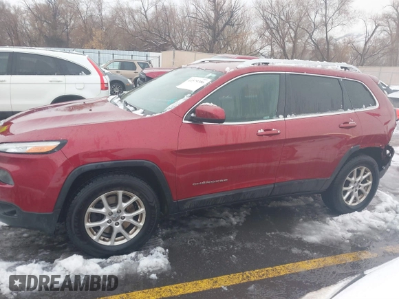 2014 Jeep Cherokee Latitude with VIN 1C4PJMCB8EW166853, listed as a IAAI auction lot 41579386 with 251,683 mi miles and . Bid and sale history available at DreamBid. Image 14.