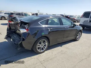 2020 Ford Fusion Titanium z VIN 3FA6P0RU3LR231920, wystawiony jako Copart lot #61643035 z przebiegiem 55 855 mil mil oraz Szkoda całkowita • Salvage title. Historia ofert i sprzedaży dostępna na DreamBid. Obrazek 3.