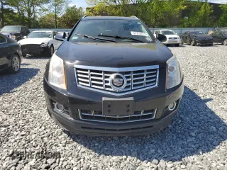 2015 Cadillac SRX Premium Collection z VIN 3GYFNGE30FS634363, wystawiony jako Copart lot #57216215 z przebiegiem 146 818 mil mil oraz Tytuł czysty. Historia ofert i sprzedaży dostępna na DreamBid. Obrazek 5.