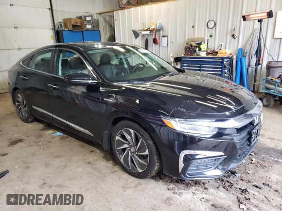 2022 Honda Insight Touring with VIN 19XZE4F9XNE017554, listed as a Copart auction lot 52786335 with 50,067 mi miles and Salvage Title. Bid and sale history available at DreamBid. Image 4.