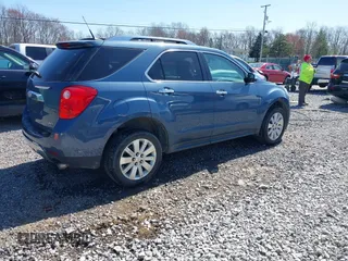 2011 Chevrolet Equinox LT w/2LT with VIN 2CNFLPE51B6420046, listed as a IAAI auction lot 41974889 with 184,621 mi miles. Bid and sale history available at carsss.com. Image 4.