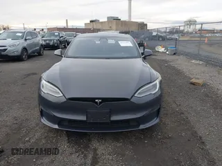 2021 Tesla Model S Long Range with VIN 5YJSA1E51MF440929, listed as a IAAI auction lot 41144902 with Not provided miles and . Bid and sale history available at DreamBid. Image 12.