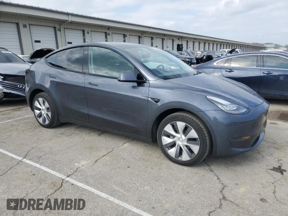 2023 Tesla Model Y Long Range with VIN 7SAYGDEE2PA024693, listed as a Copart auction lot 52595935 with 35,179 mi miles and Salvage Title. Bid and sale history available at DreamBid. Image 4.