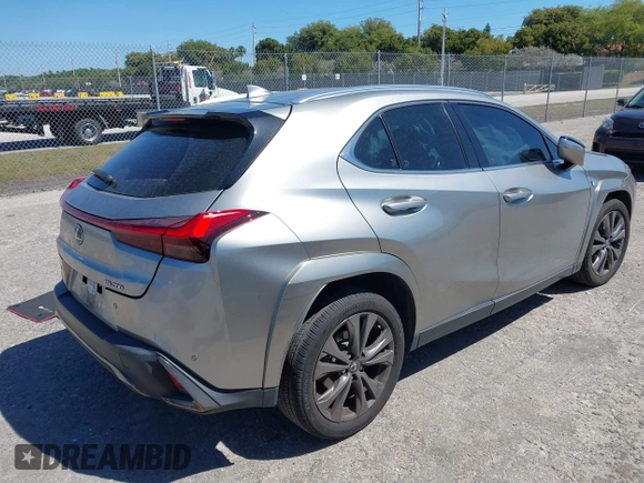2022 Lexus UX 200 F Sport z VIN JTHE3JBH3N2056014, wystawiony jako IAAI lot #41832434 z przebiegiem 25 693 mil mil oraz . Historia ofert i sprzedaży dostępna na DreamBid. Obrazek 4.