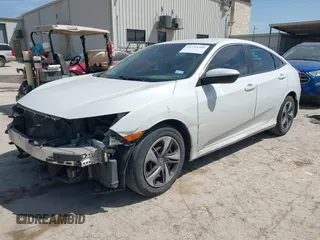 2019 Honda Civic Sedan LX with VIN 19XFC2F64KE040214, listed as a IAAI auction lot 41753300 with 74,285 mi miles. Bid and sale history available at carsss.com. Image 2.