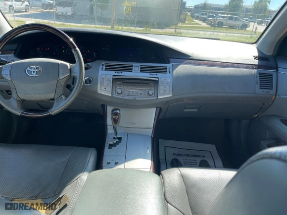 2008 Toyota Avalon XL with VIN 4T1BK36B58U267714, listed as a Copart auction lot 79895154 with 242,631 mi miles and Clean Title. Bid and sale history available at carsss.com. Image 9.