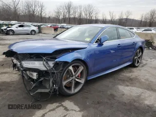 2016 Audi RS 7 Prestige z VIN WUAW2AFC9GN905459, wystawiony jako Copart lot #85105884 z przebiegiem Nie podano mil oraz Szkody całkowita. Historia ofert i sprzedaży dostępna na DreamBid. Obrazek 1.