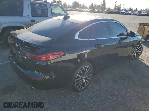 2023 BMW 2 Series 228i with VIN WBA53AK01P7L47464, listed as a Copart auction lot 84303034 with 17,425 mi miles and Salvage Title. Bid and sale history available at carsss.com. Image 3.