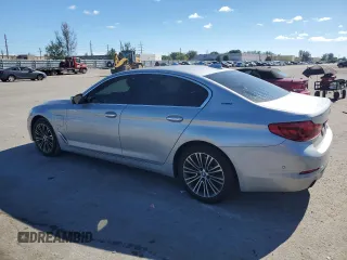 2018 BMW 5 Series 530e with VIN WBAJA9C52JG623073, listed as a Copart auction lot 82718984 with 79,543 mi miles and Clean title. Bid and sale history available at DreamBid. Image 2.