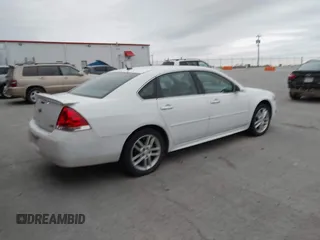 2013 Chevrolet Impala LTZ with VIN 2G1WC5E37D1223897, listed as a IAAI auction lot 41950823 with 165,237 mi miles and . Bid and sale history available at DreamBid. Image 4.