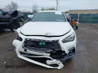 2020 Infiniti Q50 Red Sport 400 with VIN JN1FV7AR0LM660315, listed as a IAAI auction lot 41951851 with 102,475 mi miles and . Bid and sale history available at carsss.com. Image 12.