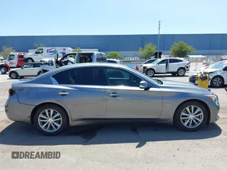 2017 Infiniti Q50 Premium with VIN JN1EV7AP0HM737377, listed as a IAAI auction lot 42507397 with 62,118 mi miles and . Bid and sale history available at DreamBid. Image 14.