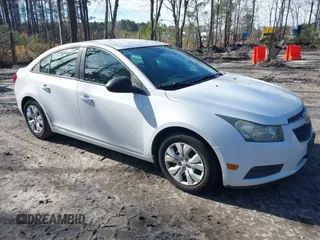 2014 Chevrolet Cruze LS z VIN 1G1PA5SH1E7167616, wystawiony jako IAAI lot #41589435 z przebiegiem 180 149 mil mil oraz . Historia ofert i sprzedaży dostępna na DreamBid. Obrazek 1.