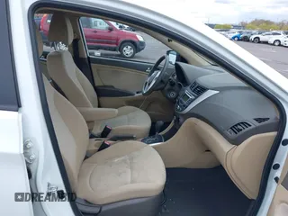 2013 Hyundai Accent GLS with VIN KMHCT4AE6DU291877, listed as a IAAI auction lot 41931876 with 136,781 mi miles. Bid and sale history available at carsss.com. Image 5.
