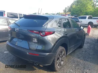 2024 Mazda CX-30 S Select Sport z VIN 3MVDMBBM1RM634542, wystawiony jako IAAI lot #42204673 z przebiegiem 24 694 mil mil oraz . Historia ofert i sprzedaży dostępna na DreamBid. Obrazek 13.