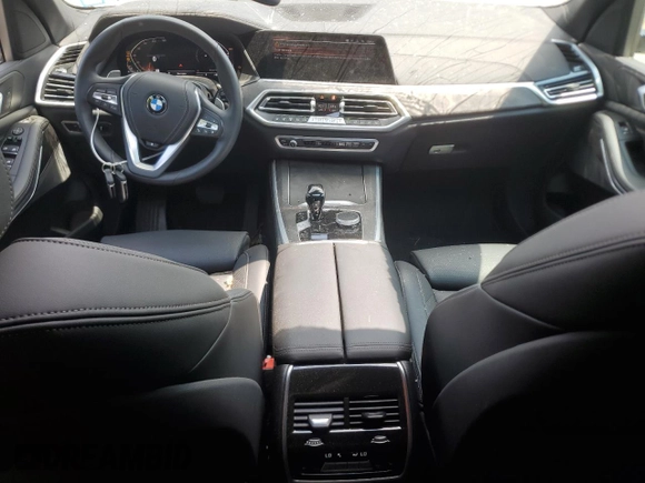 2023 BMW X5 xDrive40i with VIN 5UXCR6C03P9P75351, listed as a Copart auction lot 61465655 with 24,883 mi miles and Salvage title. Bid and sale history available at DreamBid. Image 8.