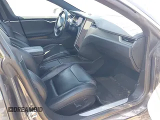 2018 Tesla Model S 75D with VIN 5YJSA1E21JF287115, listed as a IAAI auction lot 41850318 with Not provided miles and . Bid and sale history available at DreamBid. Image 5.