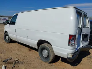 1999 Ford Econoline Cargo with VIN 1FTRE14W0XHB64440, listed as a IAAI auction lot 41645551 with 239,114 mi miles. Bid and sale history available at carsss.com. Image 3.