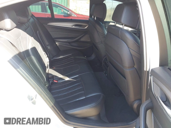 2018 BMW 5 Series M550i xDrive with VIN WBAJB9C53JB036097, listed as a IAAI auction lot 41743031 with 70,164 mi miles and . Bid and sale history available at carsss.com. Image 8.