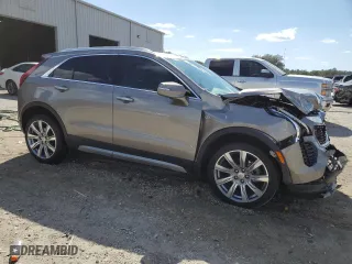 2023 Cadillac XT4 FWD Premium Luxury with VIN 1GYFZCR47PF105143, listed as a Copart auction lot 52397695 with 42,740 mi miles and Non Repairable. Bid and sale history available at carsss.com. Image 4.