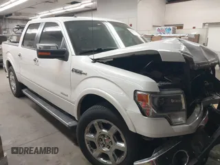 2013 Ford F-150 XL with VIN 1FTFW1CTXDKE87139, listed as a IAAI auction lot 41857584 with 156,837 mi miles and . Bid and sale history available at carsss.com. Image 1.