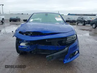 2019 Dodge Charger SXT with VIN 2C3CDXBGXKH748729, listed as a IAAI auction lot 41906272 with 76,816 mi miles. Bid and sale history available at carsss.com. Image 12.