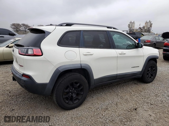2019 Jeep Cherokee Trailhawk z VIN 1C4PJMBX0KD127324, wystawiony jako Copart lot #50821445 z przebiegiem 88 604 mil mil oraz Szkoda całkowita • Salvage title. Historia ofert i sprzedaży dostępna na DreamBid. Obrazek 3.