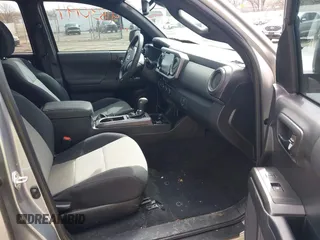 2023 Toyota Tacoma 4WD SR with VIN 3TMCZ5AN0PM609672, listed as a IAAI auction lot 41830191 with 24,244 mi miles. Bid and sale history available at carsss.com. Image 5.